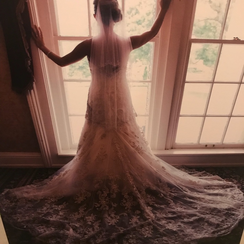 Gorgeous beaded and lace Allure bridal gown